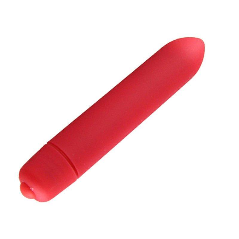 Compact bullet vibrator shown with charging accessories