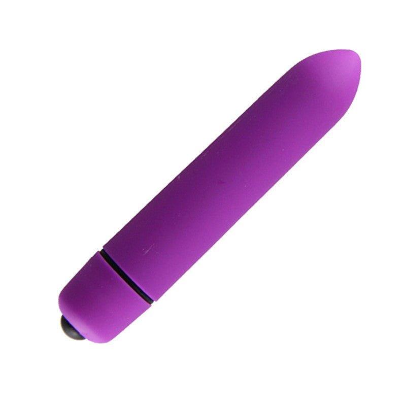Mini vibrator displayed in hand for size reference
