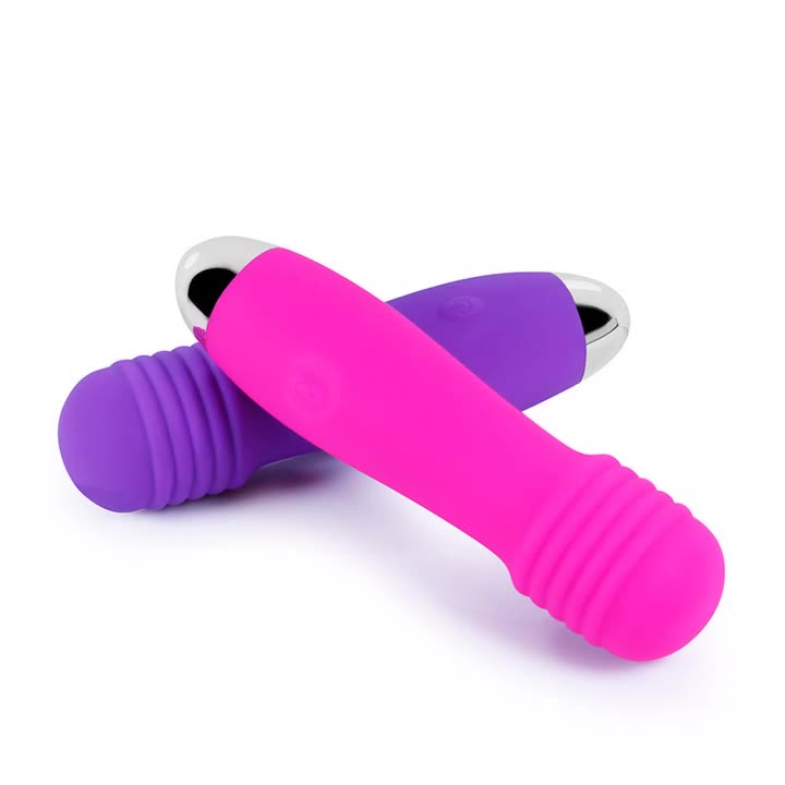 Seductiva handheld mini wand massager displayed in full view