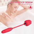 Waterproof 2-in-1 rose vibrator submerged in water demonstrating splash-resistant design.