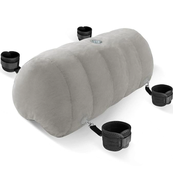 Top view of inflatable heart pillow with BDSM attachments