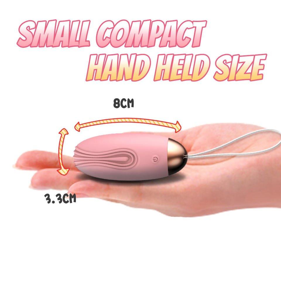Wireless vibrating love egg shown with handheld remote
