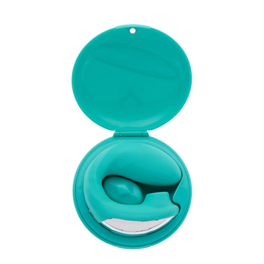 Teal version of Sutra clitoral vibrator displayed from angled side perspective