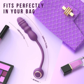 Travel-friendly rechargeable telescopic vibrator — “fits perfectly in your bag” size/portability image (268mm total length, 145mm insertable)