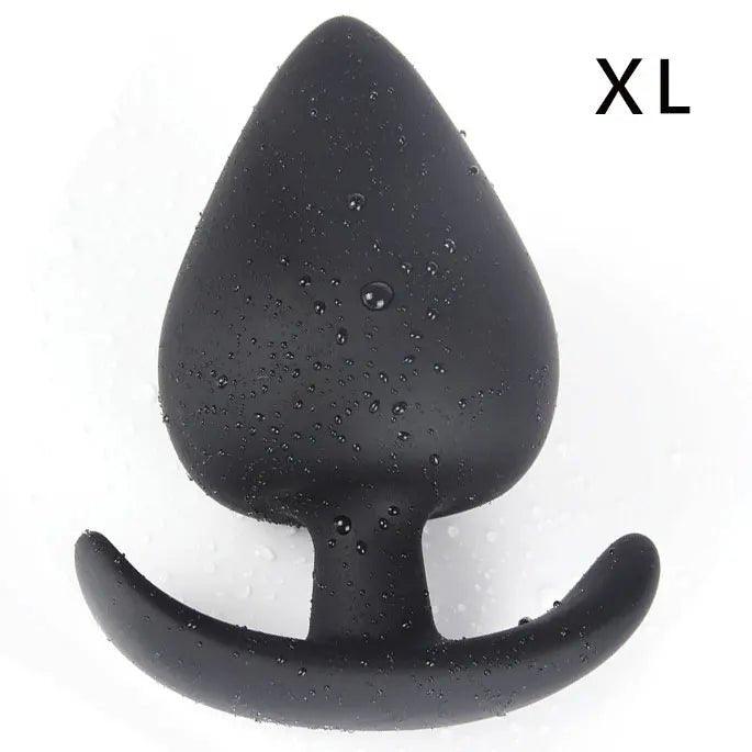 Silicone anal plug set displayed upright in four sizes