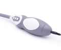 Controller charging close-up — electric aircraft cup handle with charging cable connected