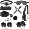 BDSM restraint set including collar, ankle cuffs, and blindfold