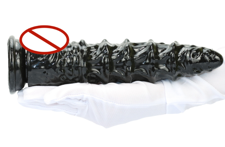 Extra-long spiral dildo shown upright with suction base