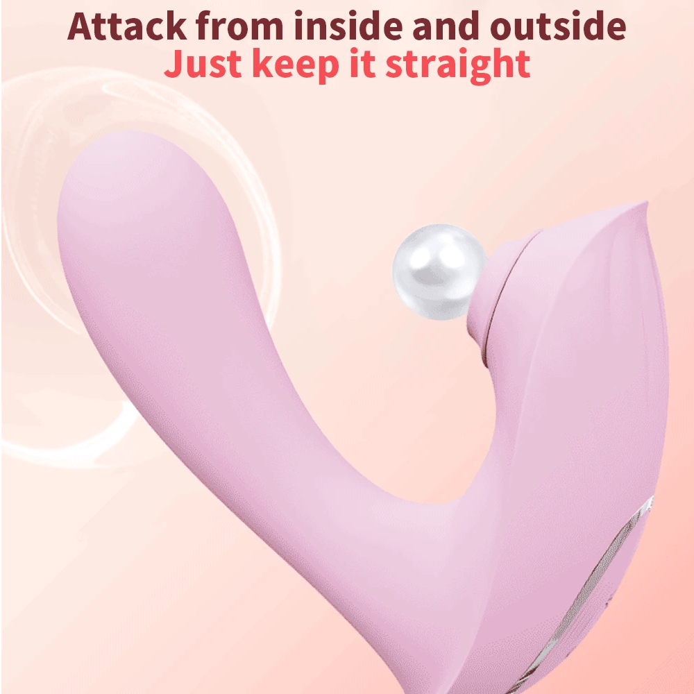 Female sucking vibrator in pink silicone with soft suction head