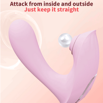 Female sucking vibrator in pink silicone with soft suction head