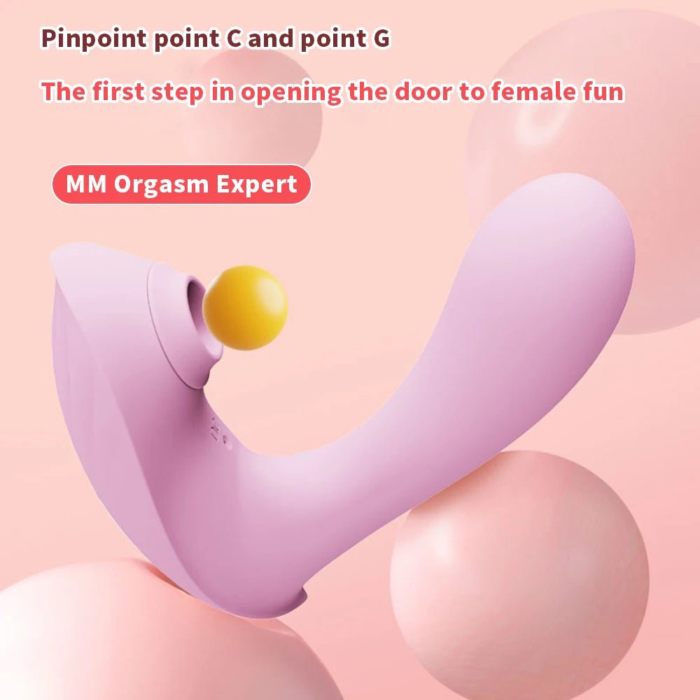 Female sucking vibrator in pink silicone with soft suction head