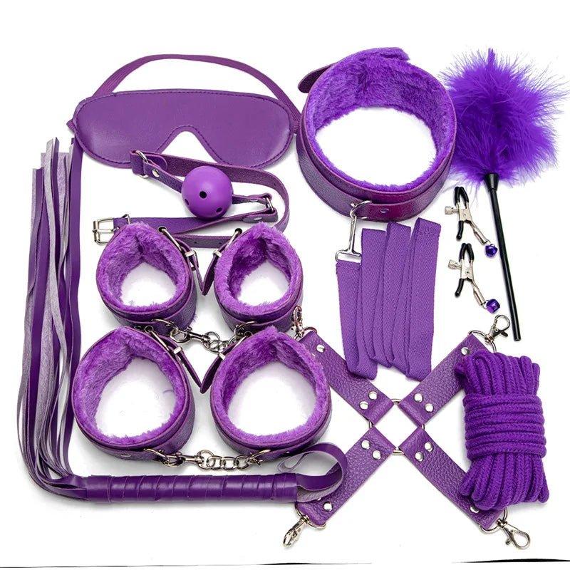Complete leather BDSM kit arranged with whip, cuffs and collar visible