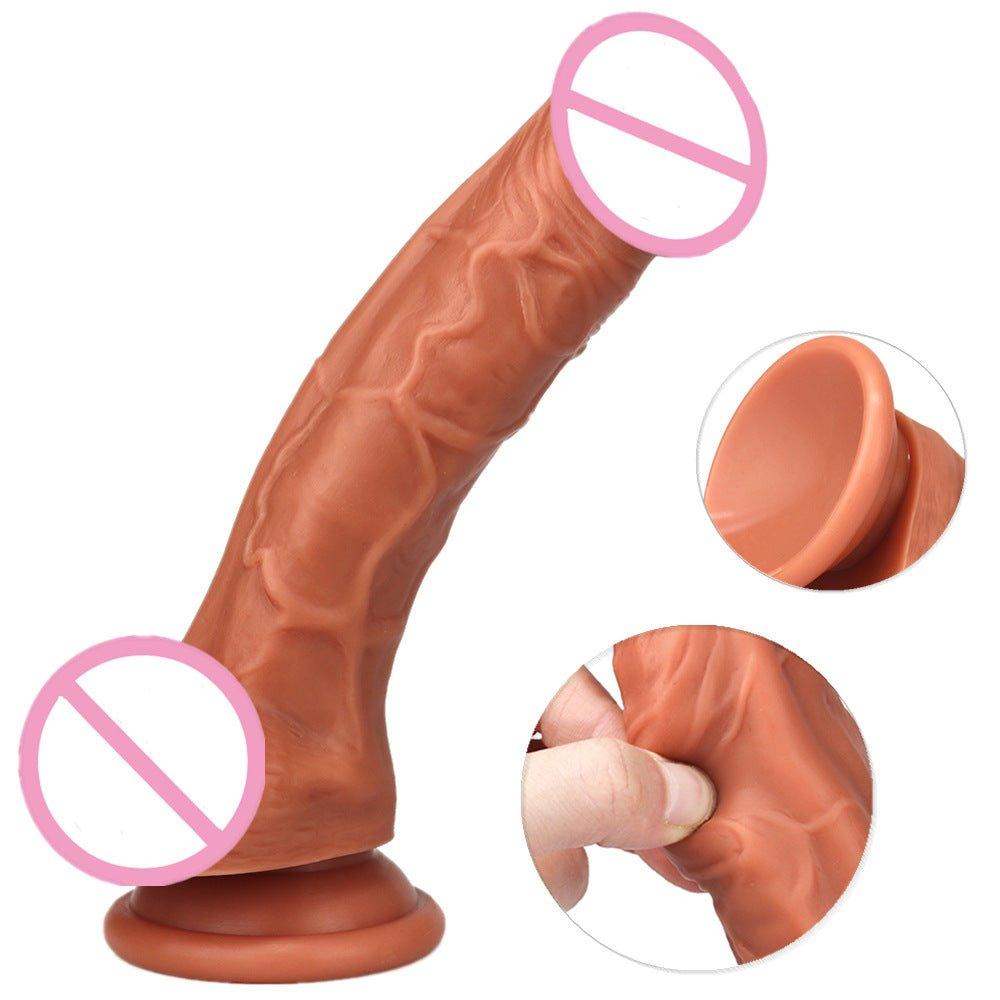Side angle of lifelike thrusting dildo highlighting textured silicone shaft