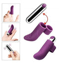 Compact silicone finger vibrator shown in hand for size reference