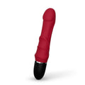 Lifelike vibrating dildo displayed showing silicone contours